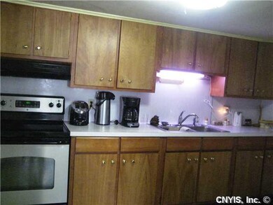 Kitchen. Very spacious kitchen, appliances stay.