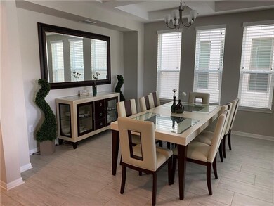 FORMAL DINING AREA W COFFERED CEILING