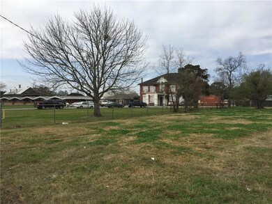 St. John School Board to left of lot