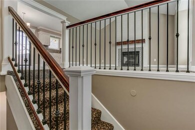 Enter into the 2-story foyer.