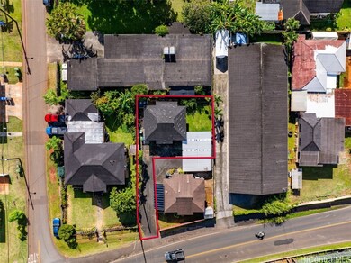 view of the home, carport and driveway. Part of a