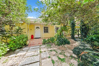 FRONT ENTRANCE TO THE 3/2 HOME. AERIAL PHOTOS PLUS TO FOLLOW. THE BEAUTY AND ENERGY IS NOT REFLECTED IN THIS PHOTO. THE PROPERTY AND HOME IS AMAZING!! A MUST SEE..