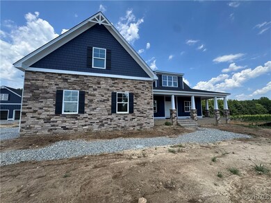 Craftsman-style home with a porch and stone siding