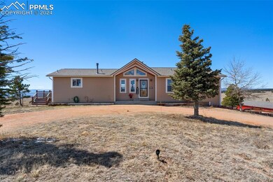 10170 Tomahawk Trail, Colorado Springs, CO 80908 - photo 2