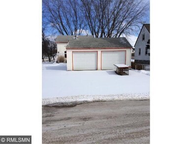 2 car detached garage with shelving and lots of st