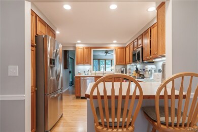 FROM THE FRONT EAT-IN AREA OVER THE BREAKFAST BAR,