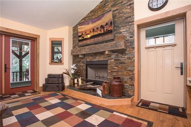 Individually set stone wood burning fireplace with