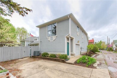 Exterior South Side with extra large window.