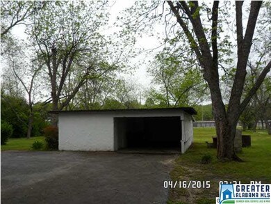 1 Car Garage and Workshop behind the home and surr