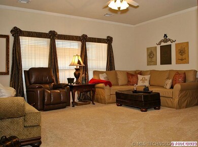 Lots of windows and light.  Newer carpet through -