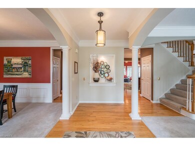 Stunning open floor plan, hardwood foyer opens to 