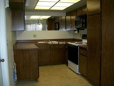 Property Photo. KITCHEN WITH APPLIANCES, TITLE FLO