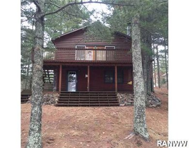 W8665 Dutch Dr, Minong, WI 54859 - photo 2