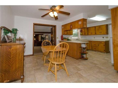 Dining Room. New flooring in dining and kitchen; dining is open to living room and family room