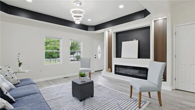 Living room with light wood-style floors, recessed