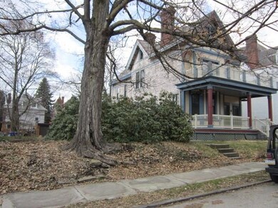Side yard and side view of the building.