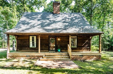 View of front of home featuring a front lawn