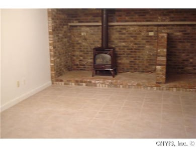 Family Room Family room with propane stove, cerami