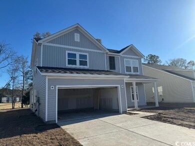 View of front of home with a garage