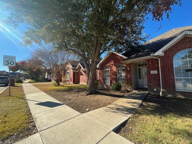 View of front of property with a front yard