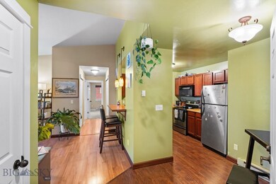 Kitchen with bar seating decorative light fixtures