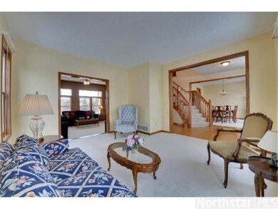 Large comfortable formal living room with custom w