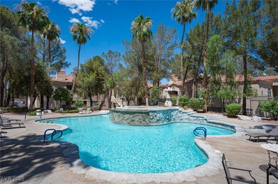 Community pool featuring a patio area