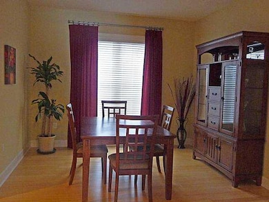Dining Room. Off of foyer and kitchen. Warm bamboo
