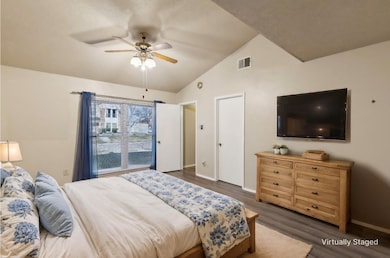 This spacious primary suite has a HUGE closet and 