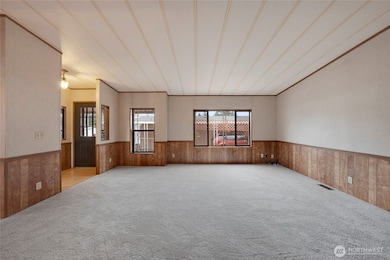 Main entry foyer on the left enters into the large Living Room.