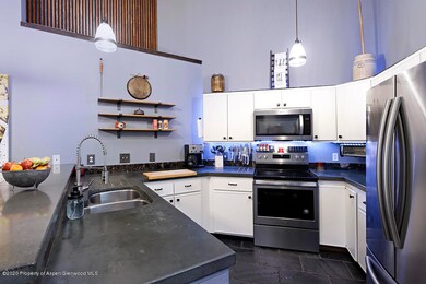 Kitchen and breakfast bar