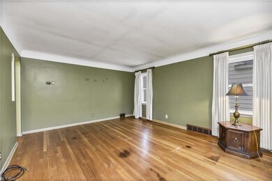 Entry view from front door. Hardwood floors.