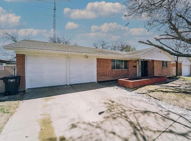 Single story home featuring a garage