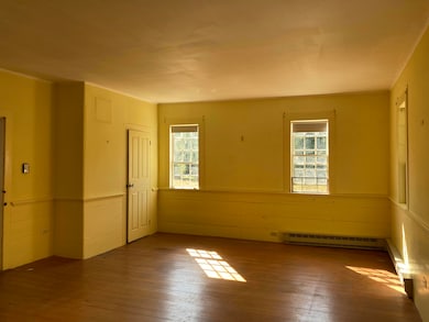Keeping room with entry from porch.