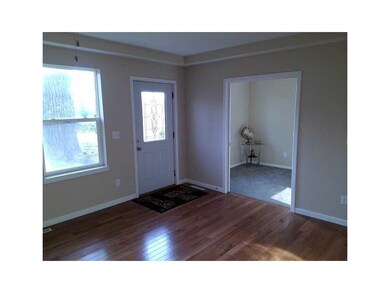 Entryway. 5th bedroom or office/den on main floor