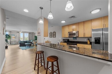 The kitchen with bar seating encourages your guest