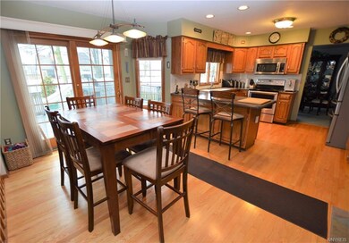 Gorgeous kitchen with eating area has new hardwood