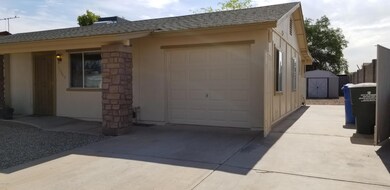 Extended parking + backyard storage shed
