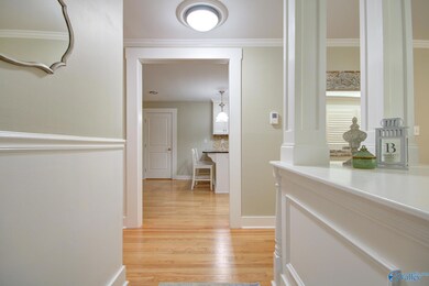 UPDATED PAINT COLORS AND HARDWOOD FLOORING ON THE FIRST FLOOR.