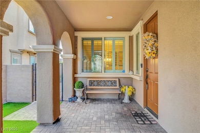 Entrance to property featuring stucco siding and a