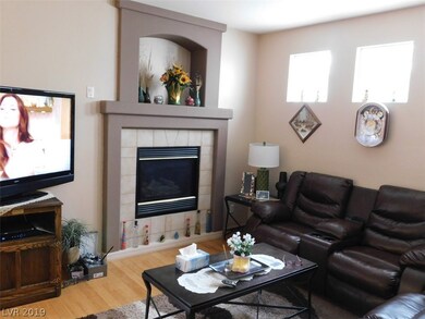 Big family room with gas fireplace, pot-shelves, d