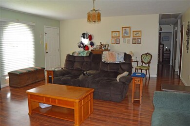 Another view of the living room. hallway leads to