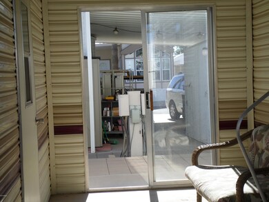 SLIDING GLASS DOOR TO BACK OF MODEL