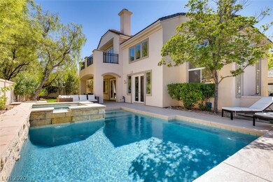 Lovely pool and spa with stone surrounds and water
