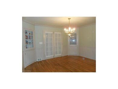 Gorgeous formal dining room with hardwood floors a