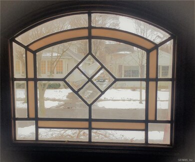 beautiful window in front door