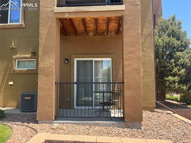 Doorway to property with stucco siding