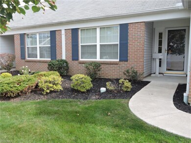 Detail of front door and landscaping.