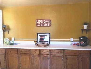 KITCHEN WITH LOTS OF COUNTER AND STORAGE SPACE