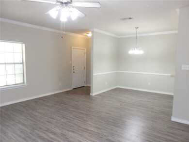 Unfurnished room featuring wood finished floors, c